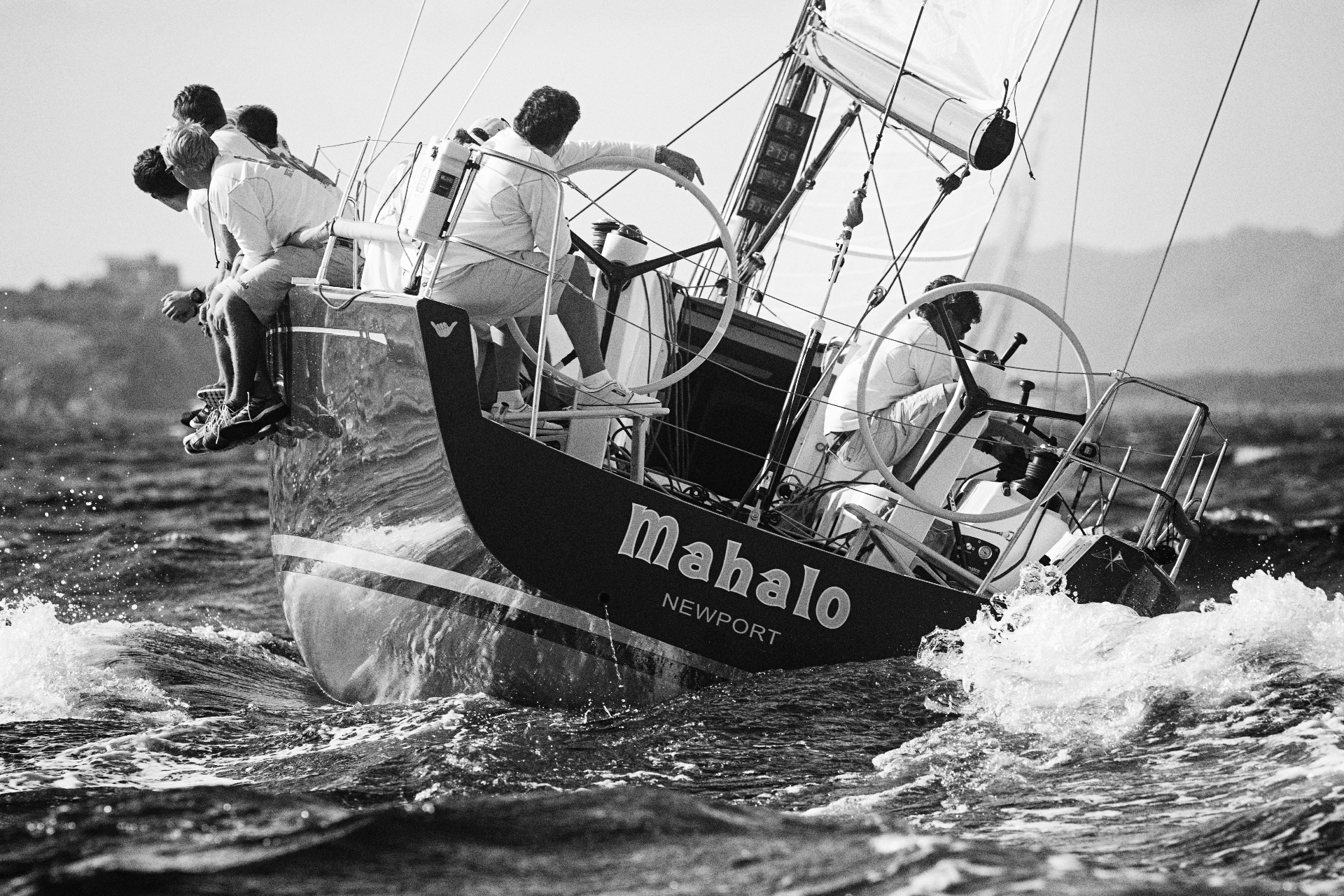 Mahalo of Newport — Charles Kenahan's Swan 42 racing yacht heeling through the swell with crew hiked out